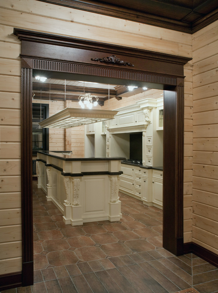 Кессонные потолки, стеновые панели, двери и кухня в деревянном доме