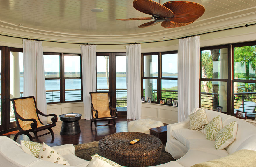 This is an example of a tropical living room in Charleston.