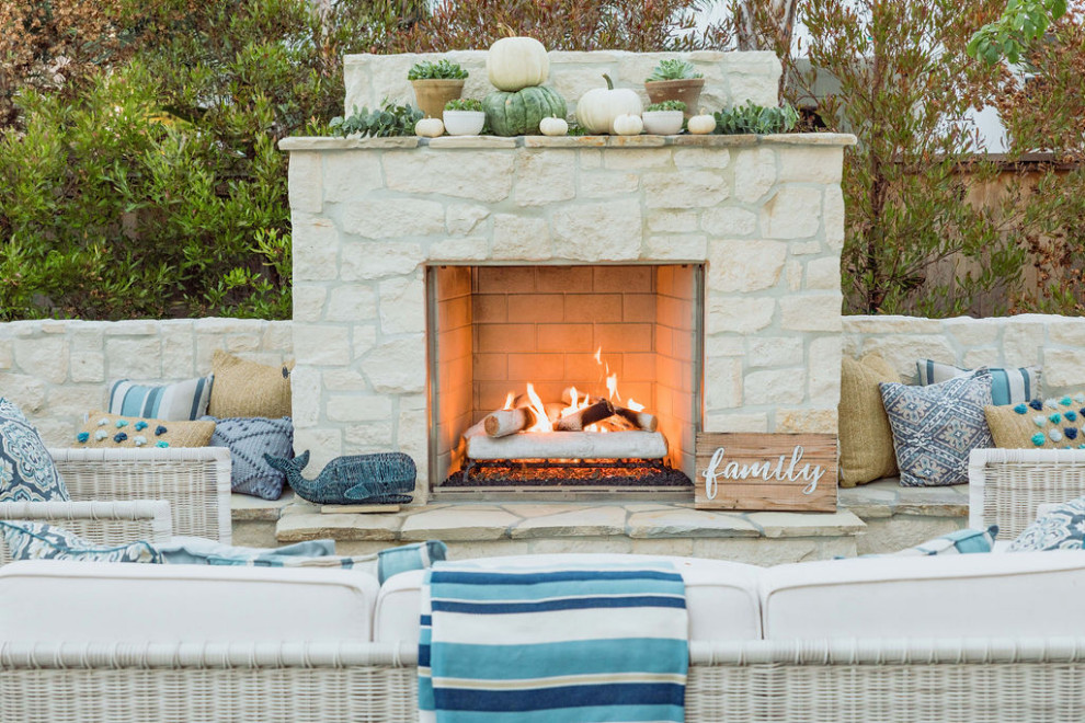 Design ideas for a medium sized traditional patio in Orange County with a fireplace.