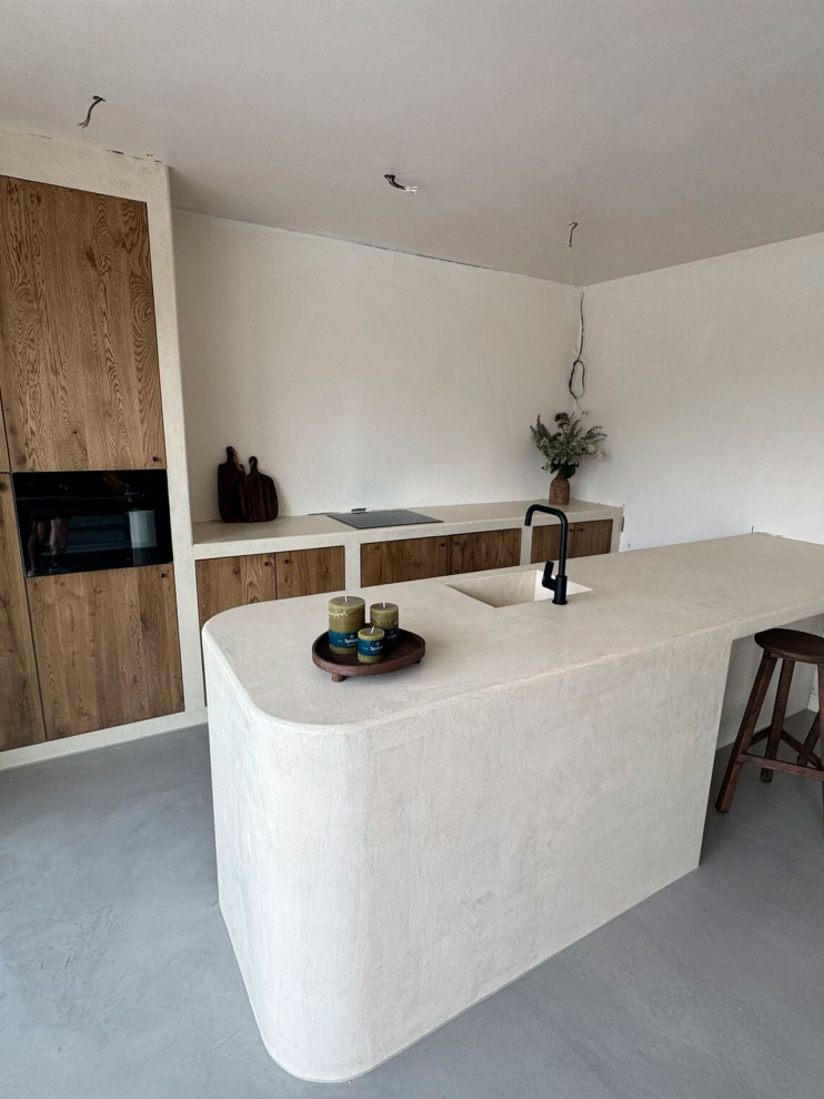 Кухня в стиле минимализм с отделкой под микроцемент