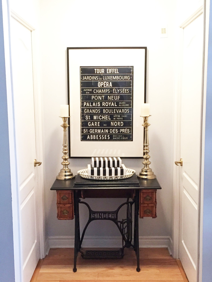 Small transitional light wood floor hallway photo in Toronto with gray walls