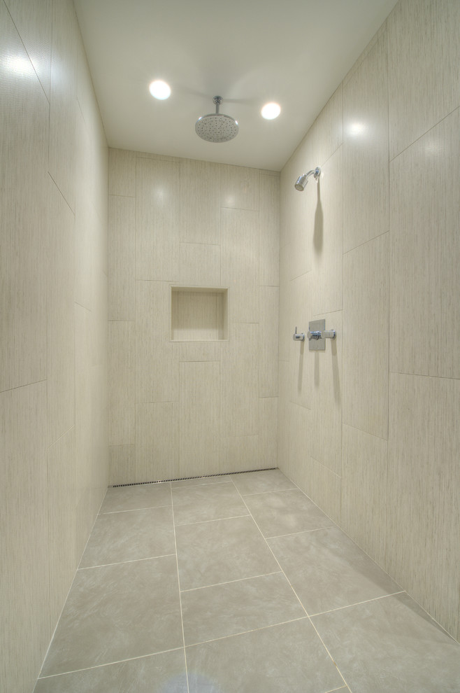 Mid-sized asian master bathroom in DC Metro with a wall-mount sink, flat-panel cabinets, medium wood cabinets, a freestanding tub, an open shower, a wall-mount toilet, gray tile and grey walls.