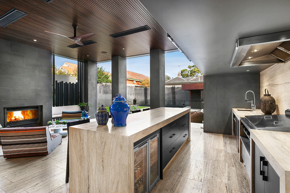 Contemporary kitchen in Melbourne with an undermount sink, flat-panel cabinets, black cabinets, beige splashback, stainless steel appliances and with island.