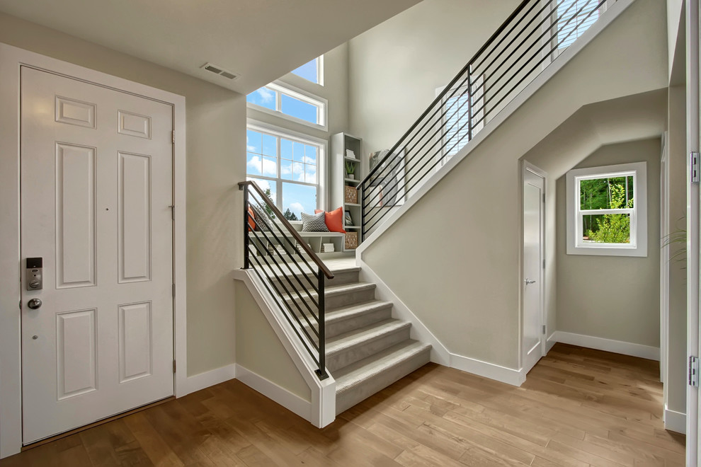 Design ideas for an arts and crafts carpeted u-shaped staircase in Seattle with carpet risers.