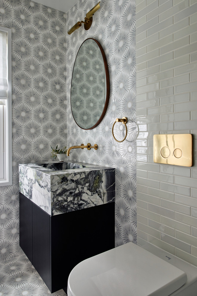 Transitional powder room in New York.