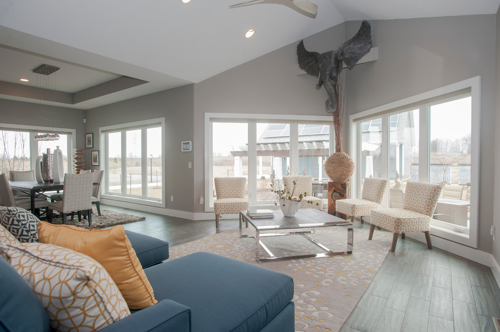 Sunroom - mid-sized transitional porcelain tile and brown floor sunroom idea with no fireplace and a standard ceiling