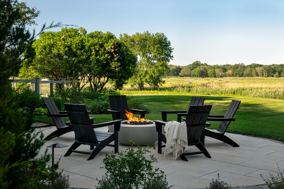 Example of a country patio design in Boston