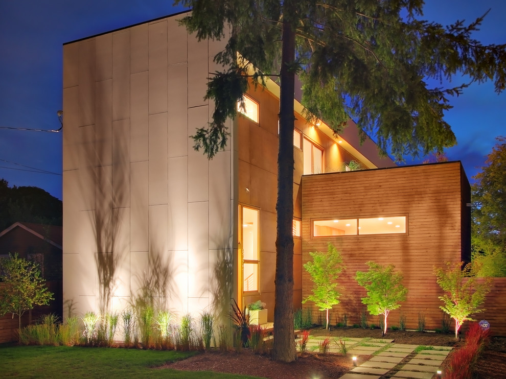 This is an example of a modern exterior in Seattle with wood siding.