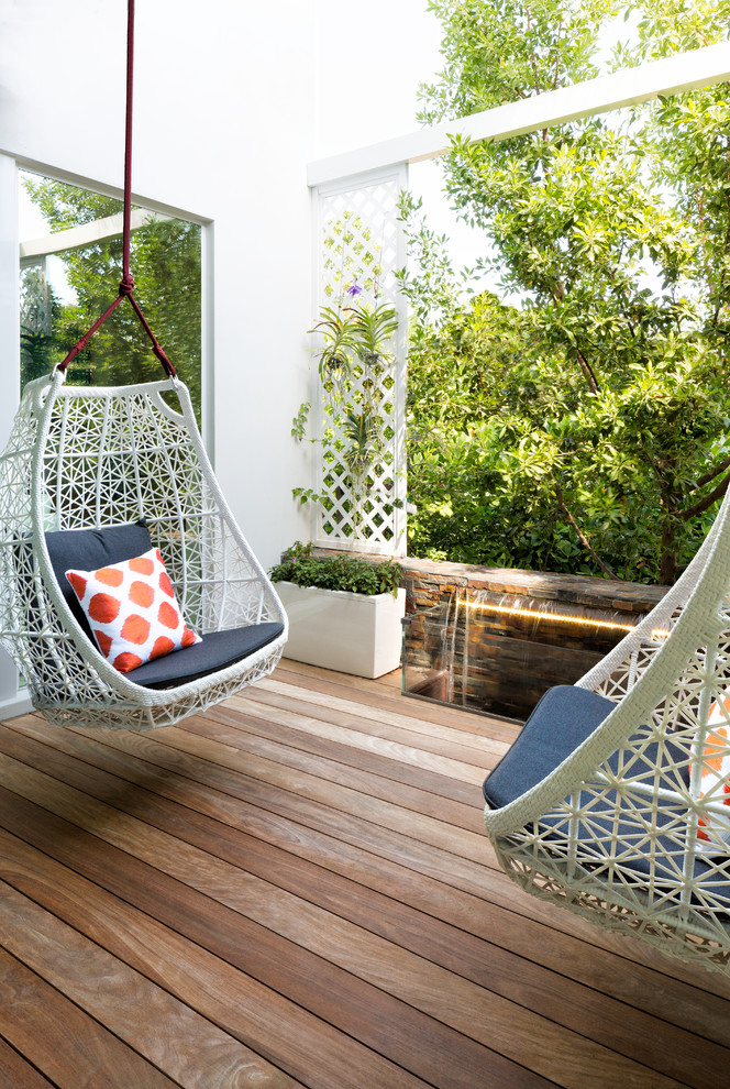 Inspiration for a mid-sized beach style deck in Miami with a container garden.