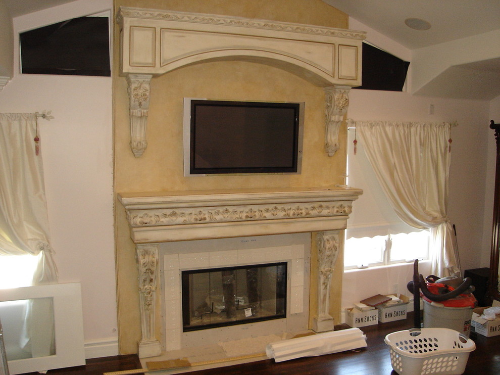 All custom fireplace surround, moldings carved by ancabald