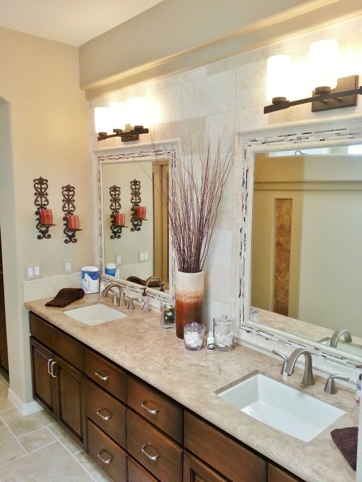 Inspiration for an expansive master bathroom in Phoenix with a drop-in sink, raised-panel cabinets, dark wood cabinets, granite benchtops, a drop-in tub, a corner shower, beige tile, stone tile, beige walls and travertine floors.