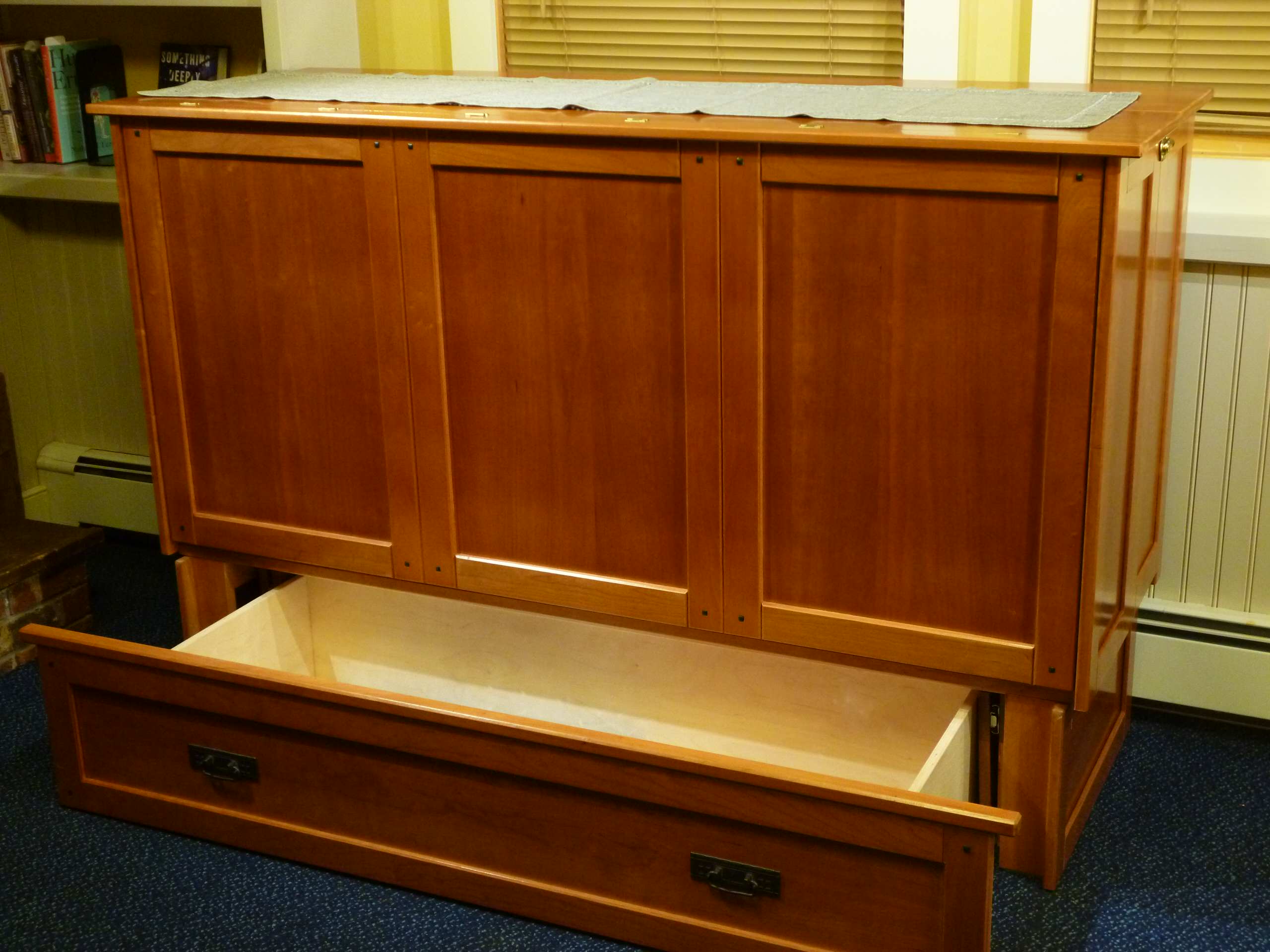 Cabinet bed- storage. Converts to queen size bed. In cherry hardwood.