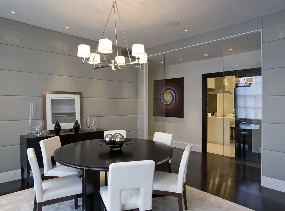 Mid-sized contemporary dining room in DC Metro with dark hardwood floors, grey walls and brown floor.
