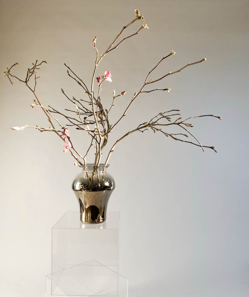 Flower arrangements in an&angel glass