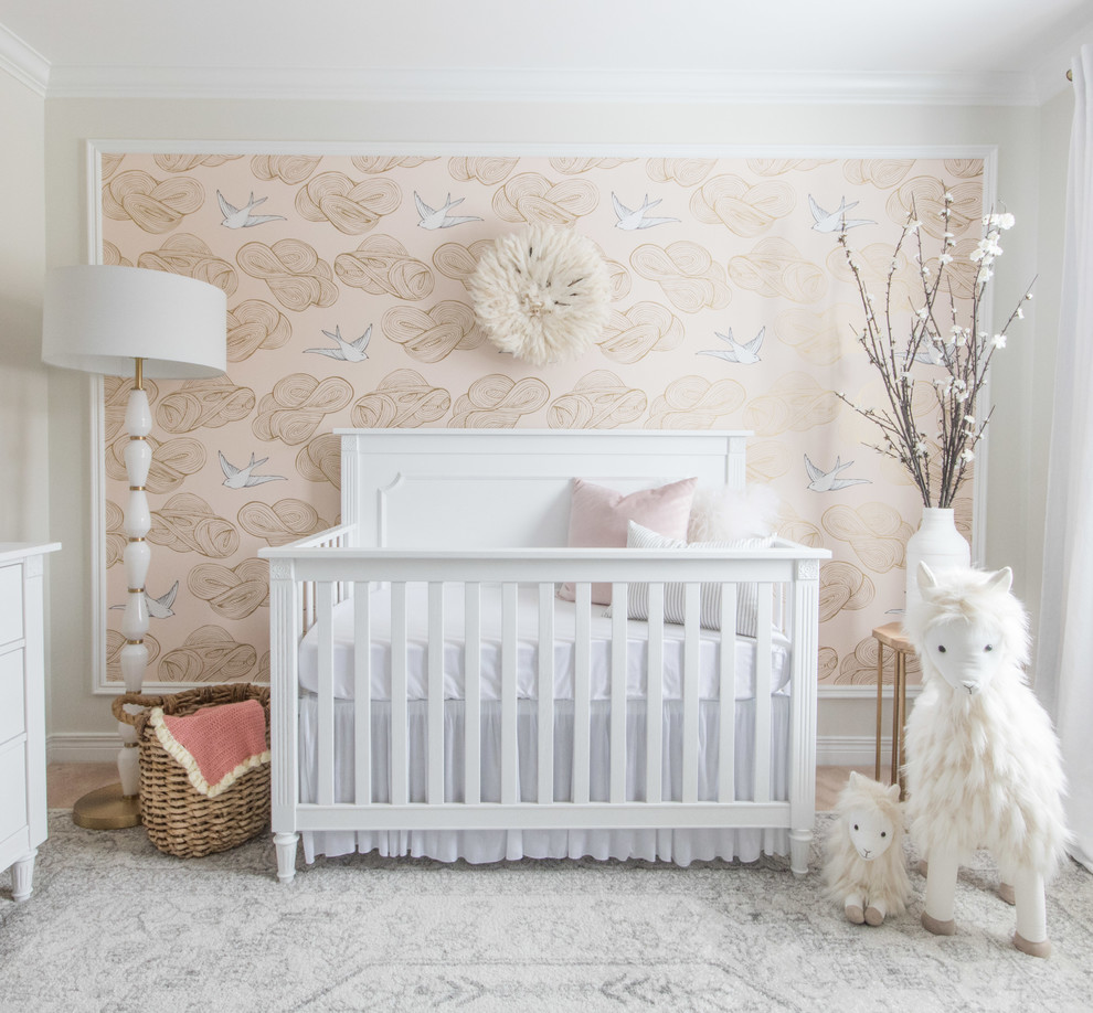 Inspiration for a mid-sized traditional nursery for girls in Ottawa with multi-coloured walls.