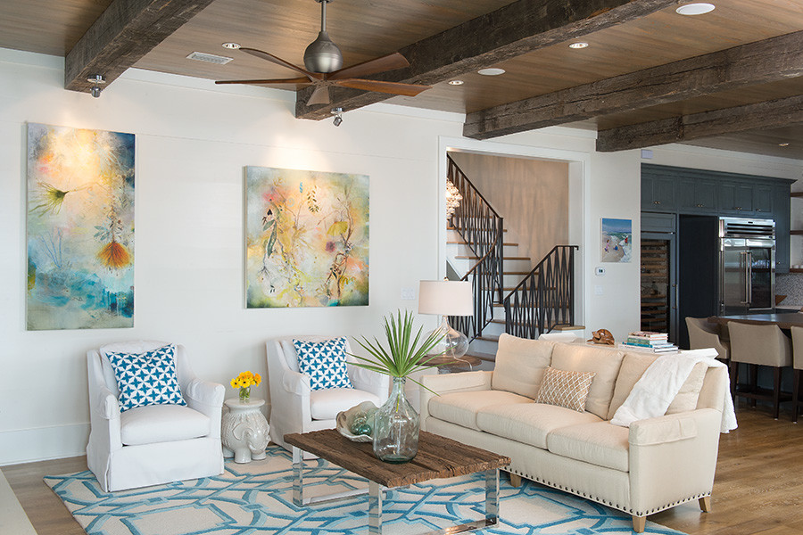Photo of a mid-sized beach style open concept living room in Miami.