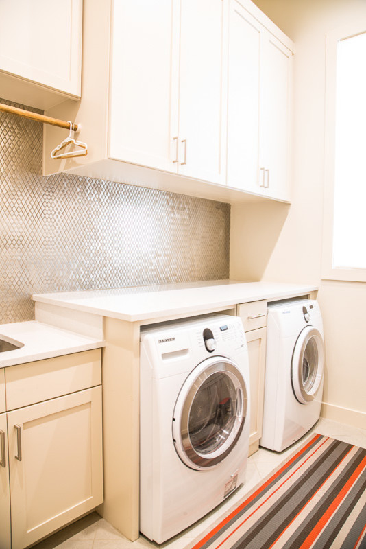 Transitional laundry room in Austin.