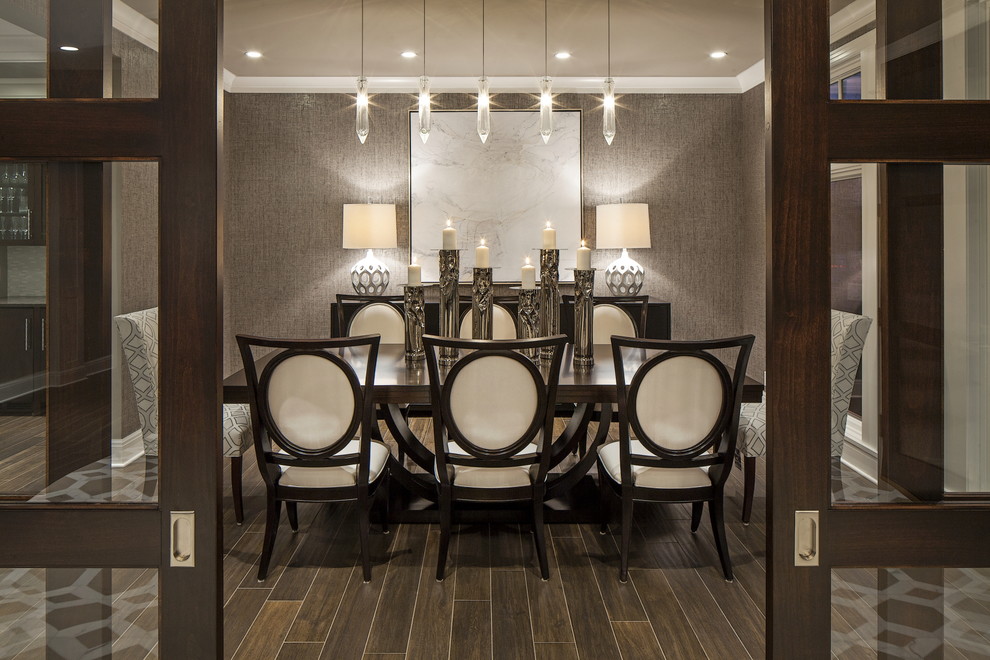 Design ideas for a large transitional separate dining room in Omaha with metallic walls and ceramic floors.