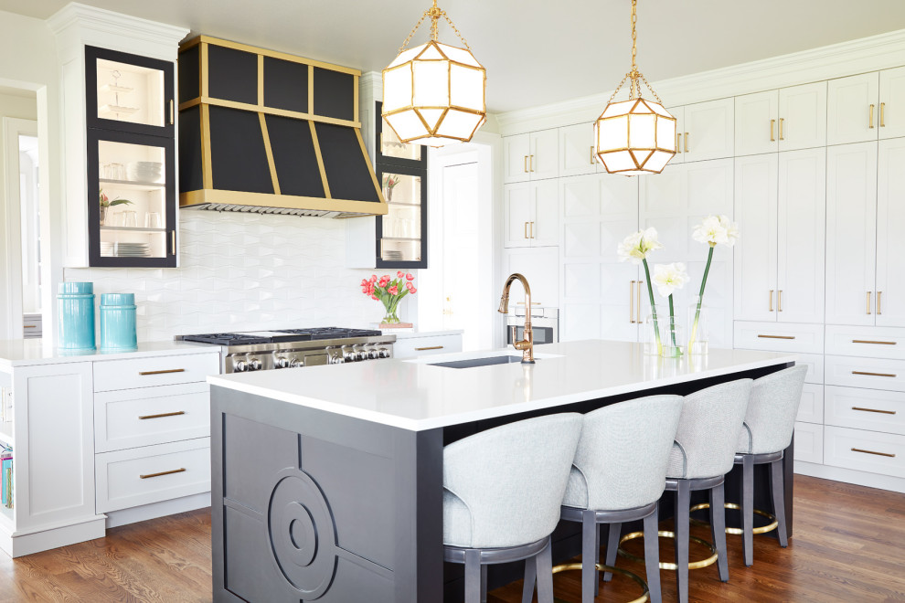 Inspiration for a large classic l-shaped kitchen/diner in St Louis with recessed-panel cabinets, white cabinets and an island.