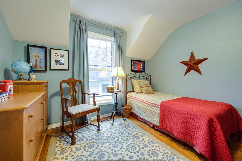 Photo of a traditional bedroom in Toronto with blue walls.