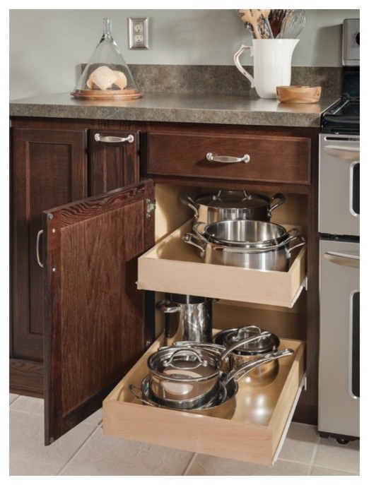 Example of a transitional ceramic tile kitchen design in Toronto with shaker cabinets, dark wood cabinets, granite countertops and stainless steel appliances