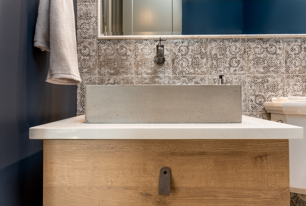 Example of a transitional home design design in Calgary