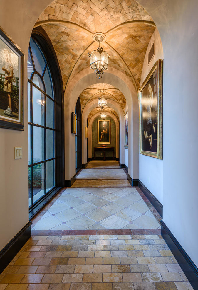 Photo of a large mediterranean hallway in Austin.