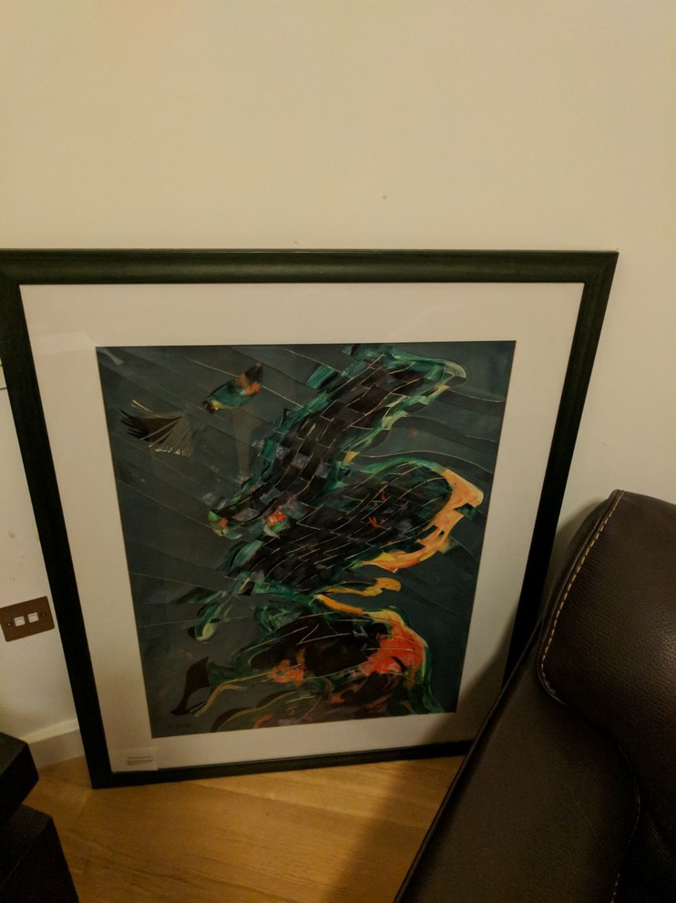 How to hang heavy art without drilling into wood