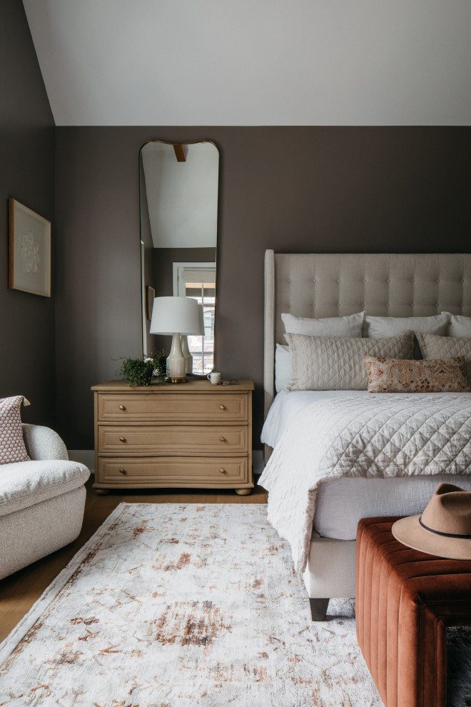 Example of a transitional bedroom design in Chicago