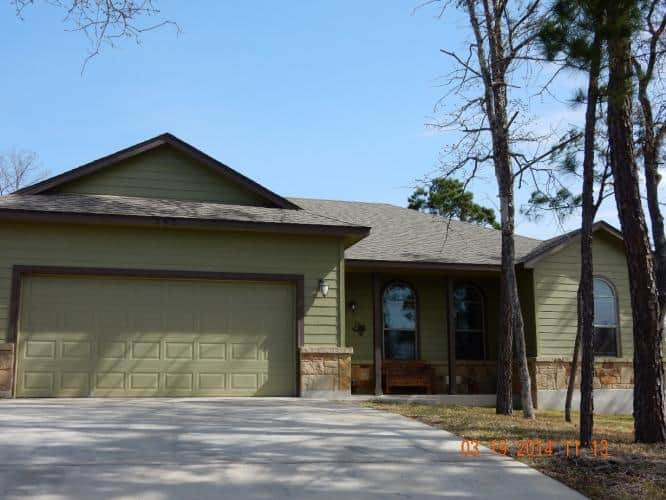 Example of a transitional home design design in Austin