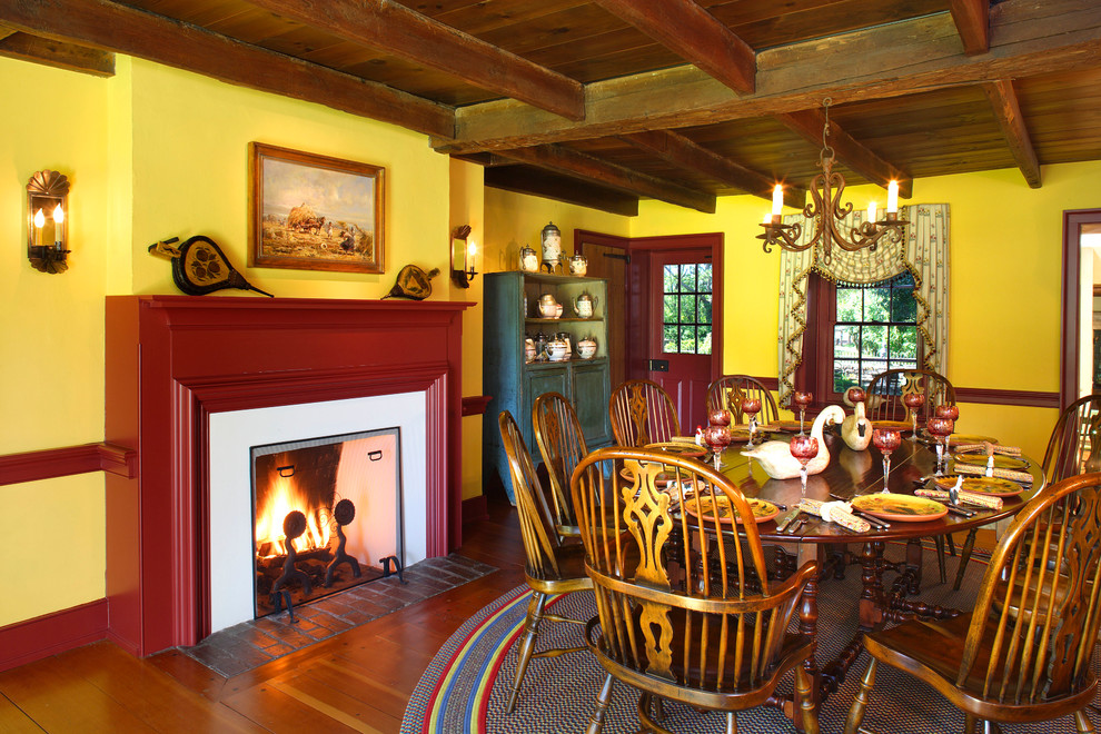 Photo of a country dining room in Philadelphia with yellow walls.