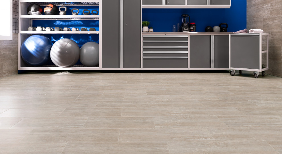 Medium sized modern multi-use home gym in Toronto with vinyl flooring.