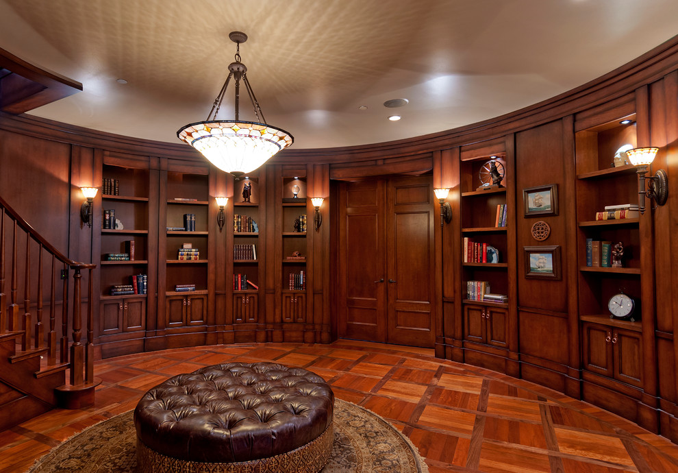 Riverton - Ewell - Mid-sized elegant medium tone wood floor and brown floor home office library photo in Salt Lake City with brown walls and no fireplace