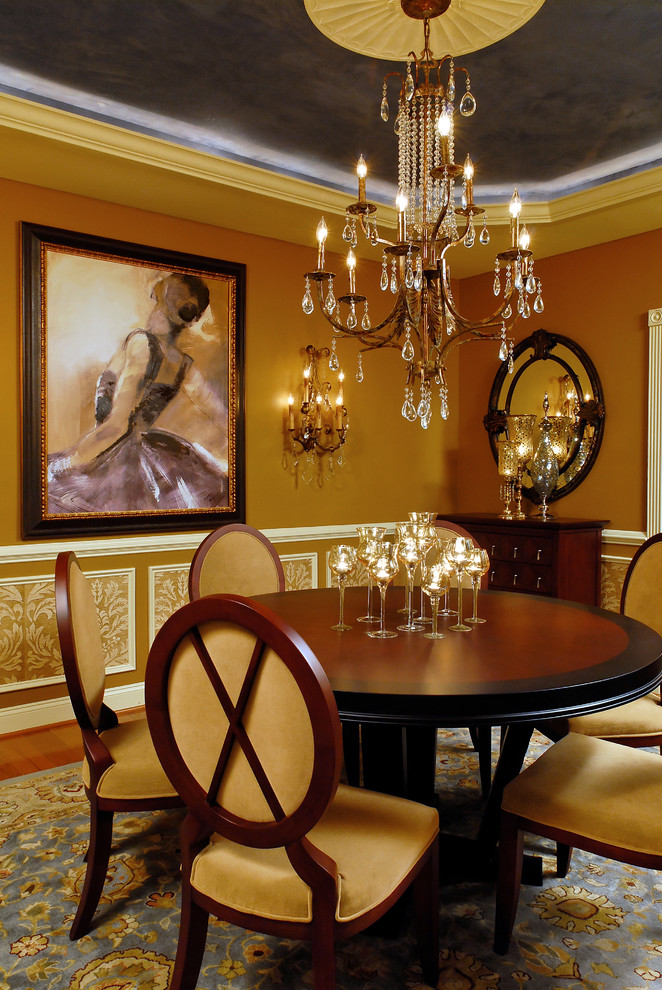 Inspiration for a traditional dining room in DC Metro with dark hardwood floors and brown walls.