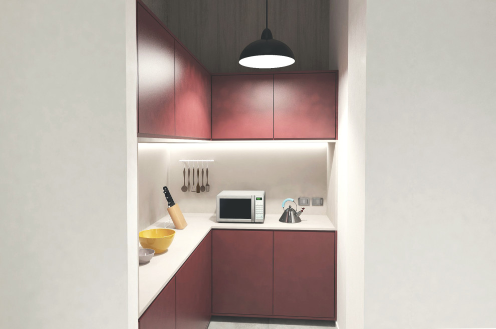 Inspiration for a small urban kitchen in Rome with concrete flooring and grey floors.