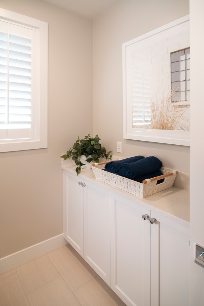 Design ideas for a transitional galley laundry room in San Francisco with recessed-panel cabinets and white cabinets.