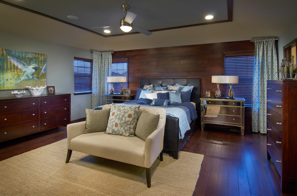 Large traditional master bedroom in Denver with beige walls, dark hardwood floors, no fireplace and brown floor.