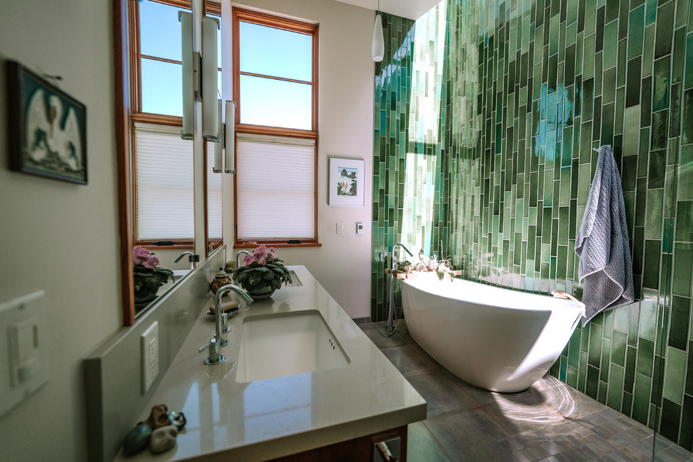 Inspiration for a mid-sized eclectic master bathroom in San Francisco with a freestanding tub, a curbless shower, green tile, ceramic tile, white walls, ceramic floors, an undermount sink, quartzite benchtops, multi-coloured floor, a hinged shower door and grey benchtops.
