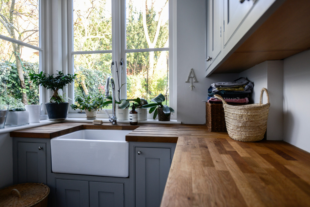 Inspiration for a transitional laundry room in London.