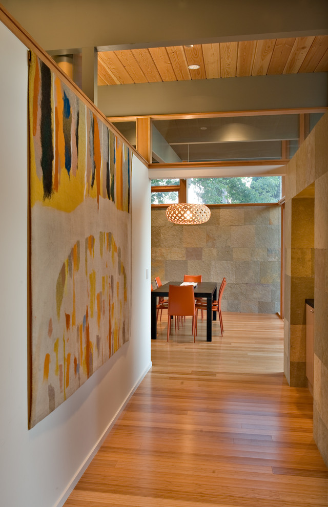 Inspiration for a midcentury hallway in San Francisco with white walls.