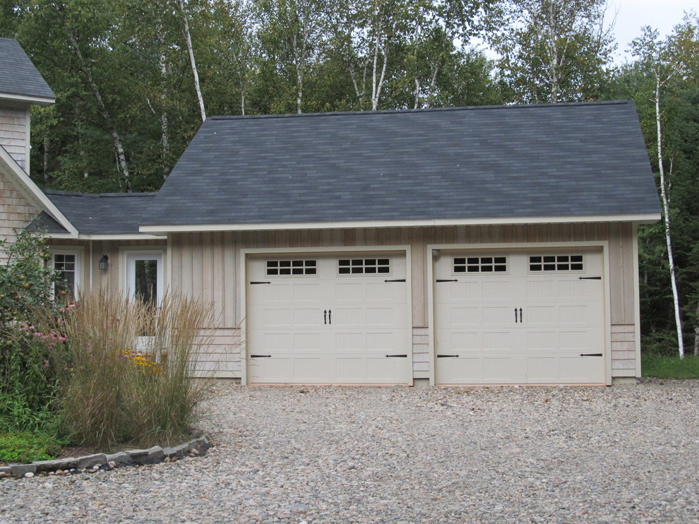 Photo of a mid-sized country attached two-car garage in Other.