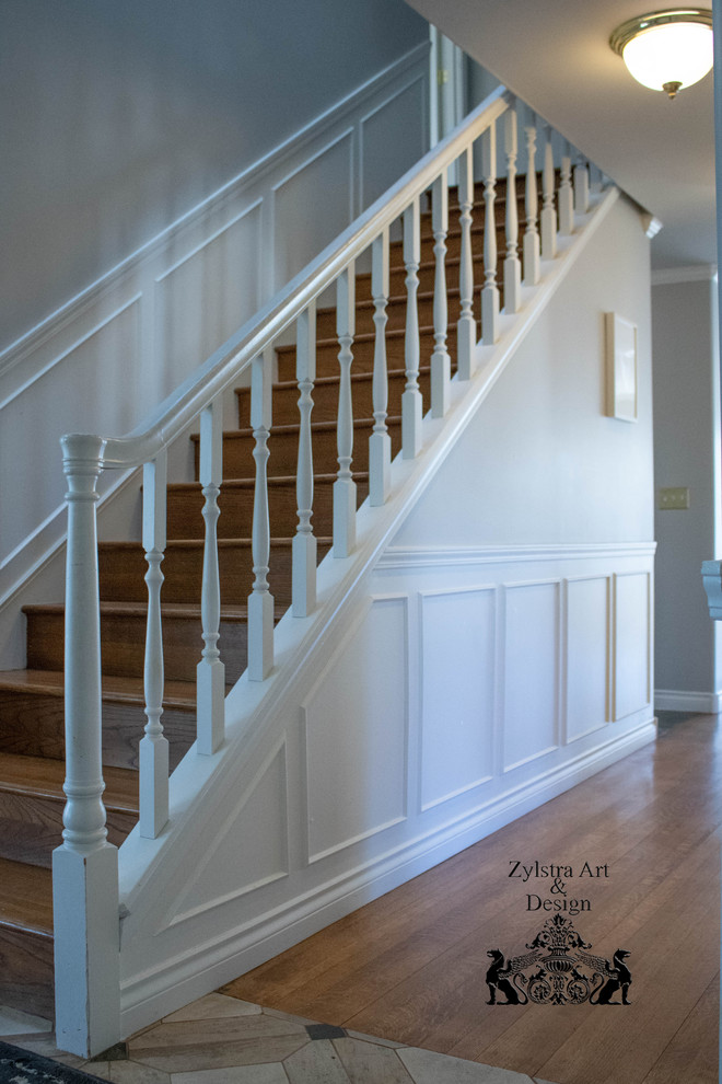 This is an example of an expansive traditional staircase in Seattle.