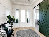 Farmhouse Entry by Solitude Homes