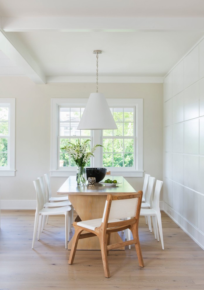 Mid-sized transitional dining room in Providence with white walls, light hardwood floors and no fireplace.