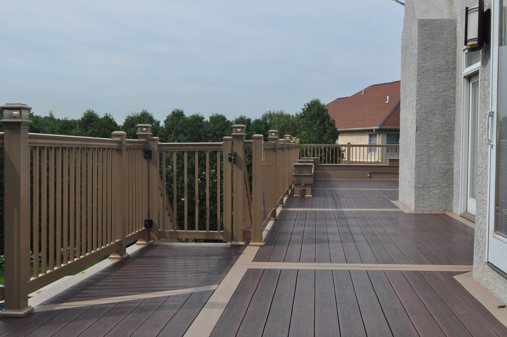 Deck - mid-sized transitional backyard deck idea with no cover