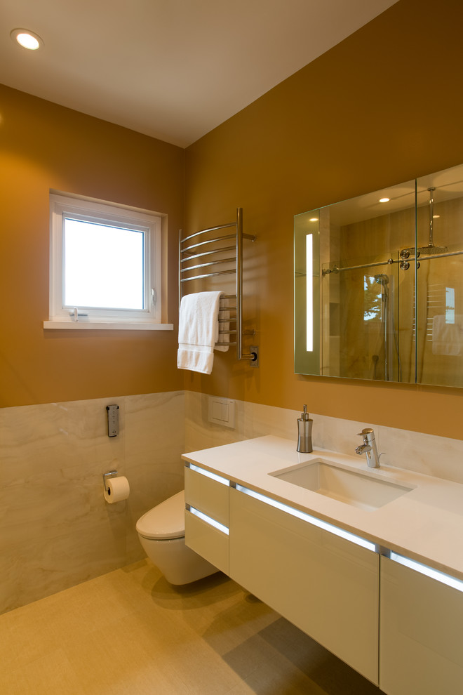 Photo of a mid-sized modern 3/4 bathroom in San Francisco with flat-panel cabinets, white cabinets, an open shower, a bidet, porcelain tile, orange walls, porcelain floors, an undermount sink, granite benchtops and a sliding shower screen.