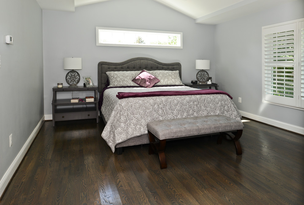 Inspiration for a mid-sized modern bedroom in DC Metro with grey walls, dark hardwood floors and brown floor.