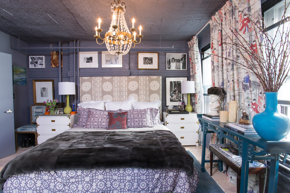 Design ideas for a mid-sized eclectic master bedroom in New York with purple walls, light hardwood floors and beige floor.