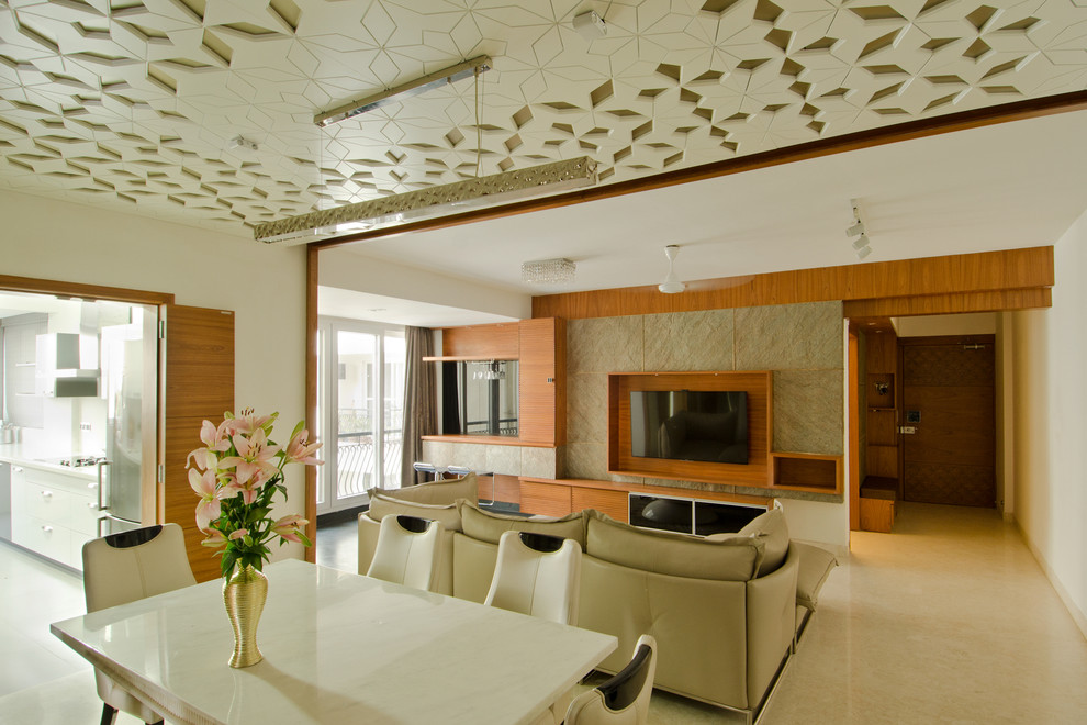 Photo of a mid-sized contemporary separate dining room in Bengaluru with white walls and marble floors.