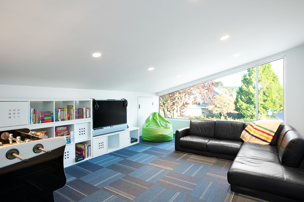 Photo of a contemporary enclosed family room in Vancouver with a game room and white walls.